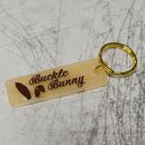 Buckle Bunny Gold Keychain Angled Close Up View