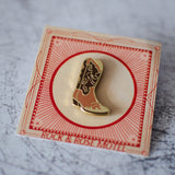 Brown Cowboy Boot Enamel Pin in Packaging