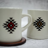 The Red & Brown Versions Of The Out Yonder Mug